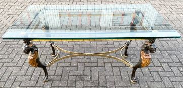 A heavy cold painted cast-steel, brass, and glass dining table on neoclassical style stretchered