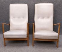 A pair of 1950's Italian vinyl and birch framed model 829 chairs by Gio Ponti for Figli de Camedeo