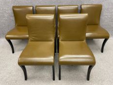 A set of six green simulated ostrich leather dining chairs by Decca with maker's label. H.87cm.