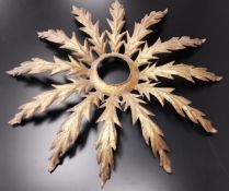 A French gilt metal sunburst pendant ceiling light shade. Dia.62cm
