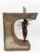 An abstract constructivist style metal sculpture by Robert De Quin. H.55 W.39cm.
