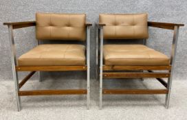A pair of mid-century teak, aluminium and faux leather armchairs. H.75cm.
