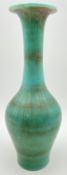 A signed turquoise studio pottery vase of baluster form. Incised mark to the base. H.27cm.