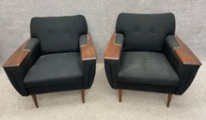 A pair of mid-century Danish style teak chairs with original wool upholstery, on round tapered