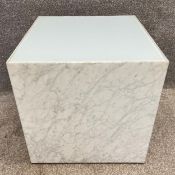 A white marble side table with an inset glass top. H.51 W.50 D.50cm.