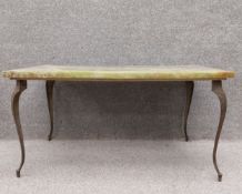 A simulated onyx coffee table on slender gilt metal cabriole supports with moulded knees. H.46 W.