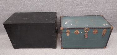A heavy painted trunk, reinforced with iron strap-work with cast iron handles, along with an early
