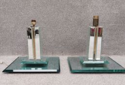 A pair of Art Deco mirrored glass and brass table lamps of pilaster form on a square stepped