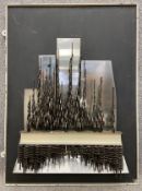 A large mid-century wall hanging steel sculpture on a black backing in a painted white steel frame