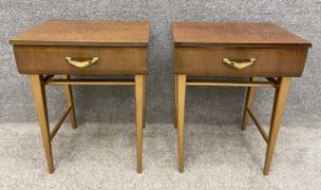 A pair of mid-century teak bedside tables each with a single frieze drawer on square tapered