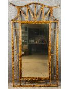 A late 19th/early 20th century tiger bamboo pagoda dressing or wall mirror with its original plate