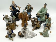 A collection of ten painted and glazed ceramic Chinese Mud Men figures with impressed marks. H.