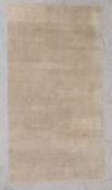 A contemporary hand knotted rug with scrolling modernist linework over a biscuit ground. W.173 L.