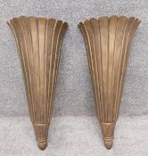 A pair of Art Deco style giltwood wall sconces of flared form with a scalloped edges. H.67cm