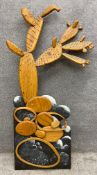 A large carved pine and tulip wall hanging sculpture attributed to Phil Monk titled 'The Cactus'.