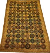 A mid-century short shag pile rug with a repeating circles wit floral designs over a mottled mustard
