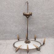 An early 20th century Art Deco brass ceiling light/chandelier of shallow plafonnier form having a