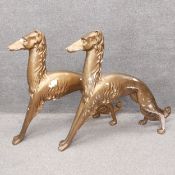 A pair of floor standing gold painted Art Deco stylised fibreglass Italian greyhounds. (With some