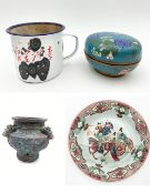 A collection of Oriental items to include a cloisonne box with flowers over a teal patterned ground,