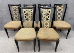 A set of six Art Deco ebonised dining chairs each with a curved top rail with tapering sides