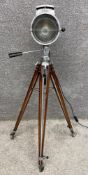An early to mid 20th century industrial Bullfinch light on adjustable teak tripod supports. H.