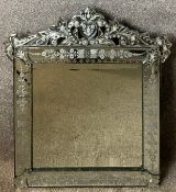 A Venetian style mirror with a square central plate framed by four etched, cut and bevelled outer