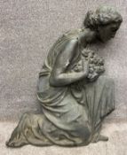 A large late 19th/early 20th century Art Nouveau cast bronze applique depicting a kneeling woman