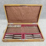 A thirty-six piece hallmarked 800 continental silver dining cutlery service of twelve place settings