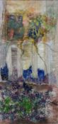 A framed and glazed intricately embroidered and dyed abstract textile artwork with an indistinct