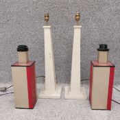 Two pairs of Art Deco style table lamps to include a pair in painted wood of pilaster form on square