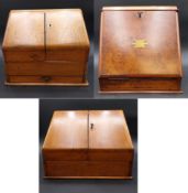 A 19th century walnut and brass inlaid stationery cabinet/writing box with a fitted interior housing
