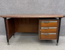 A vintage teak pedestal desk. H.77 W.150 D.74cm (In need of some repair as seen).