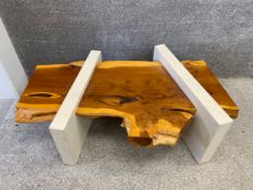 A contemporary Portland stone and Yew 'Ixion' coffee table by Peter Carling. Signed Peter Carling