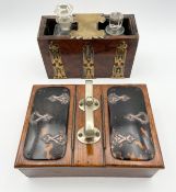An Austin Dublin burr walnut and brass locking drinks box with two cut glass decanters and a