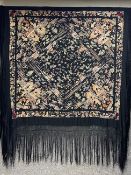 A 1920s Chinoiserie embroidered Manila shawl intricately embroidered with figures, animals and