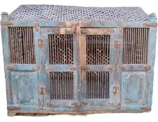 A late 18th/early 19th century animal cage, with a heavy latticed iron strap-work roof and sides,