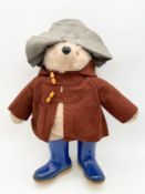 An original Gabrielle Designs Paddington Bear with amber eyes, felt hat, duffle jacket with turned
