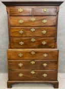 A Georgian mahogany chest on chest having a moulded cornice above two short over three long