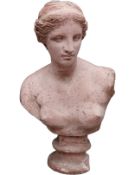 A late 19th/early 20th century patinated plaster bust after The Venus de Milo depicting Aphrodite