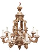 A large 19th century Baroque style giltwood chandelier carved with all-over scrolling foliate
