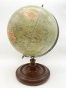 An early 20th century Phillips' 14 inch Terrestrial Globe model 2615 on a turned mahogany base. H.