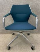 A Brunner 'Ray' model 9232 office swivel chair with a tilt action in aluminium and teal fabric