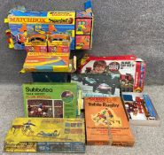 A collection of vintage boxed children's toys and games to include Matchbox, Subbuteo, Waddington'