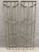 A pair of vintage painted iron door or window grilles. H.170 W.47.5cm