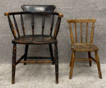 An elm seated captain's armchair and a child's kitchen chair, both C.1900. H.80 W.58 D.46cm