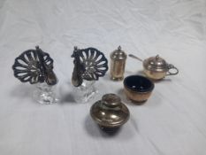 A hallmarked silver condiment set, a hallmarked silver stopper and a pair of white metal and crystal