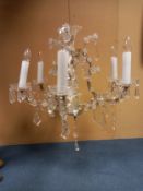 A six branch cut glass chandelier. Dia. 62cm