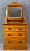A Victorian satin walnut dressing chest. H.147 W.77 D.49cm