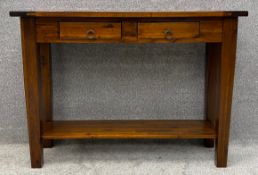 A contemporary teak console or hall table with bronzed metal handles. H.80 W.110 D.40cm