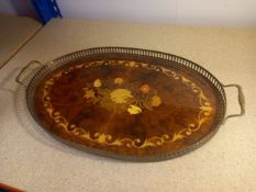 A vintage burr walnut and inlaid tray with a pierced brass surround and handles. L. 52cm
